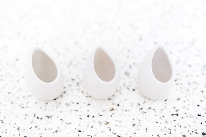 Trio of Small Ivory Ceramic Vases with Flat Bottom and Hole for Hanging